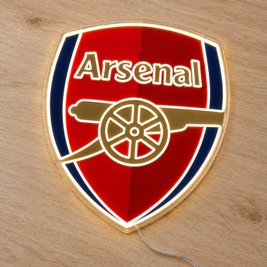 Arsenal LED Neon Sign, featuring team logo displayed on a wooden surface.