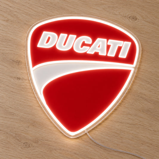 Ducati LED Neon Sign, featuring illuminated vehicle logo on a wooden surface.