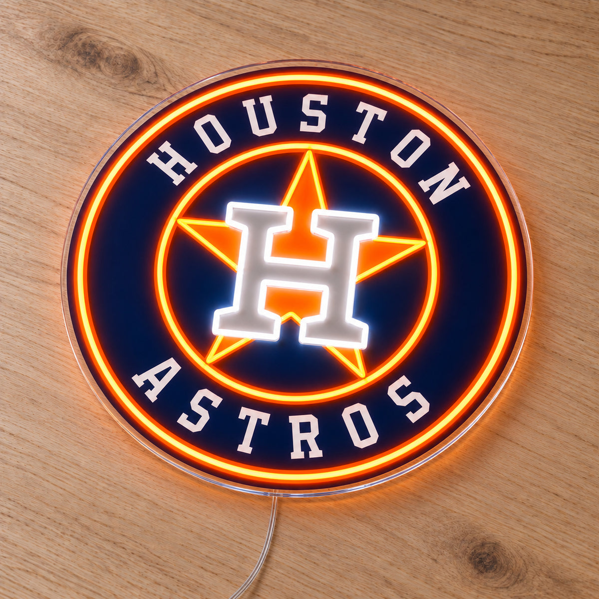 Houston Astros LED Neon Sign, featuring illuminated team logo on a wooden surface.