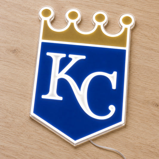 Kansas City Royals LED Neon Sign, featuring team logo displayed on a wooden surface.