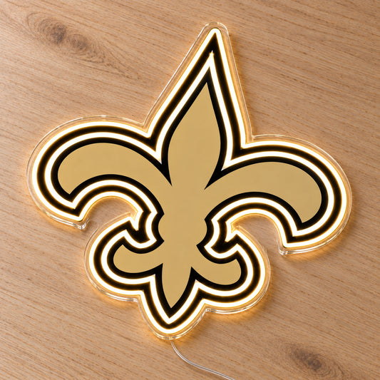 New Orleans Saints LED Neon Sign, featuring team logo displayed on a wooden surface.