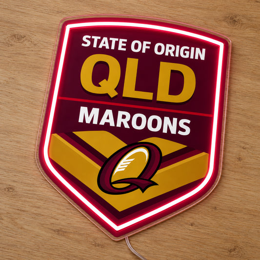 Queensland Maroons State of Origin LED Neon Sign, featuring illuminated team logo on a wooden surface.