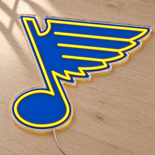 St Louis Blues LED Neon Sign, featuring team logo displayed on a wooden surface.