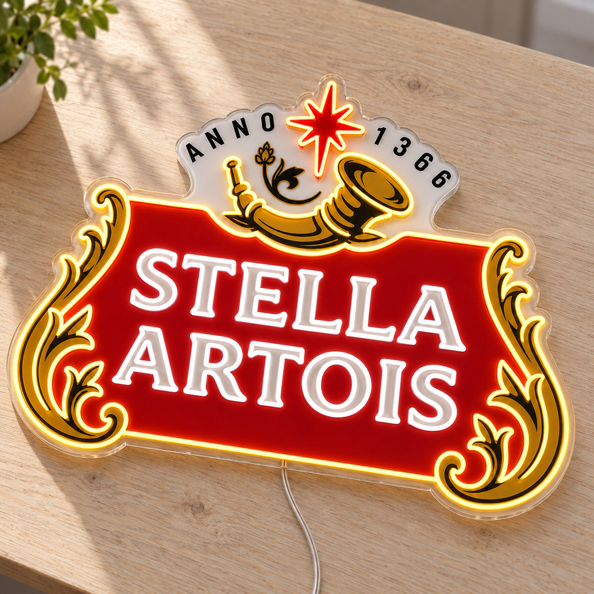 Stella Artois LED Neon Sign, featuring beer-brand logo displayed on a wooden surface.