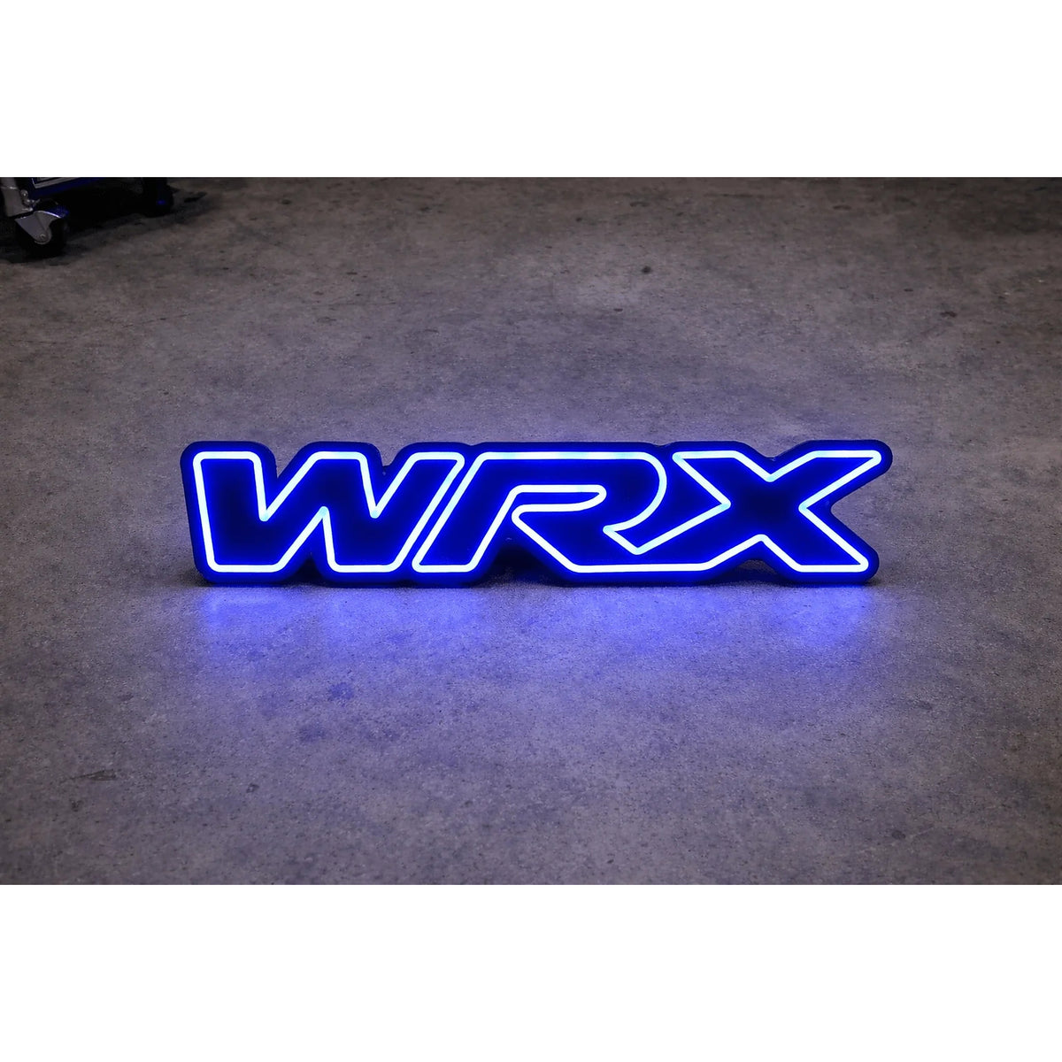 Subaru WRX LED Neon Sign in blue, featuring WRX lettering on a dark surface.