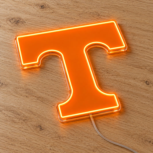 Tennessee Volunteers Power T LED Neon Sign, featuring team logo displayed on a wooden surface.