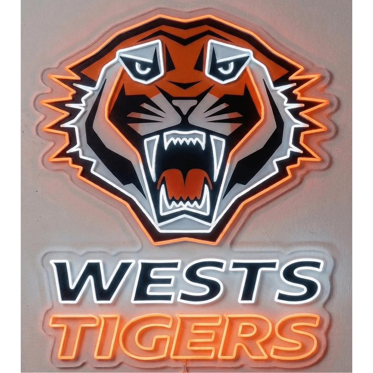 Wests Tigers Neon Sign, featuring illuminated team logo on a light background.