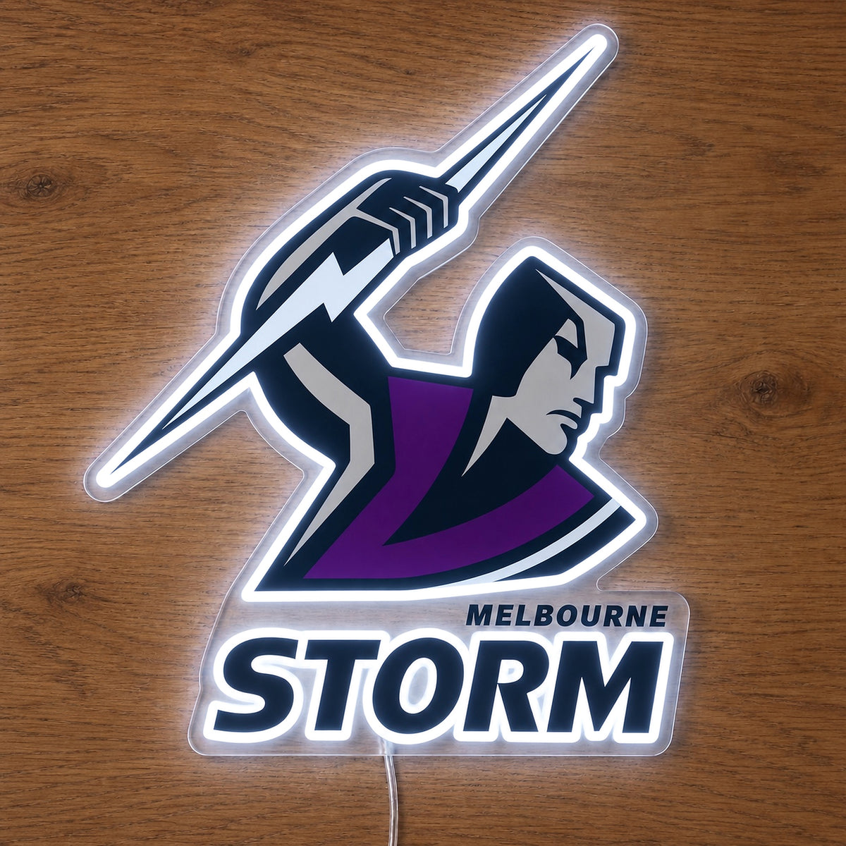 Melbourne Storm Neon Sign, featuring illuminated team logo on a wooden surface.