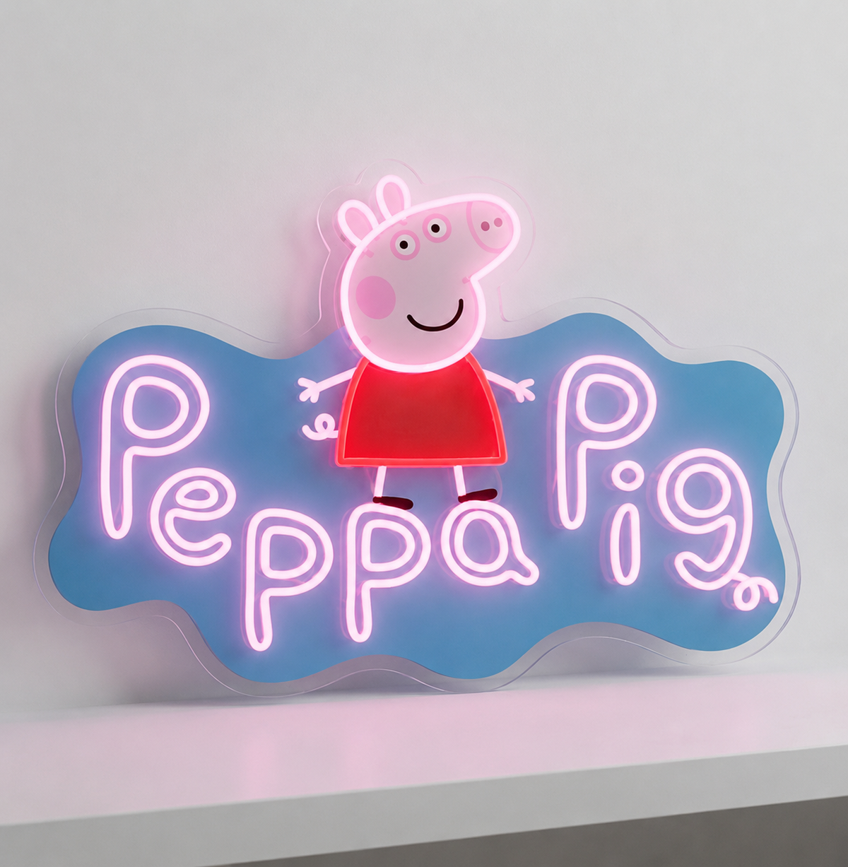 Peppa Pig (Pink) LED Neon Sign in pink and blue, featuring Peppa Pig character and lettering on a light surface.