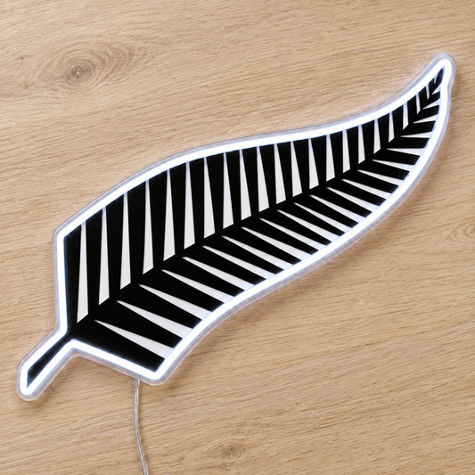 All Blacks New Zealand Rugby LED Neon Sign, featuring team logo displayed on a wooden surface.