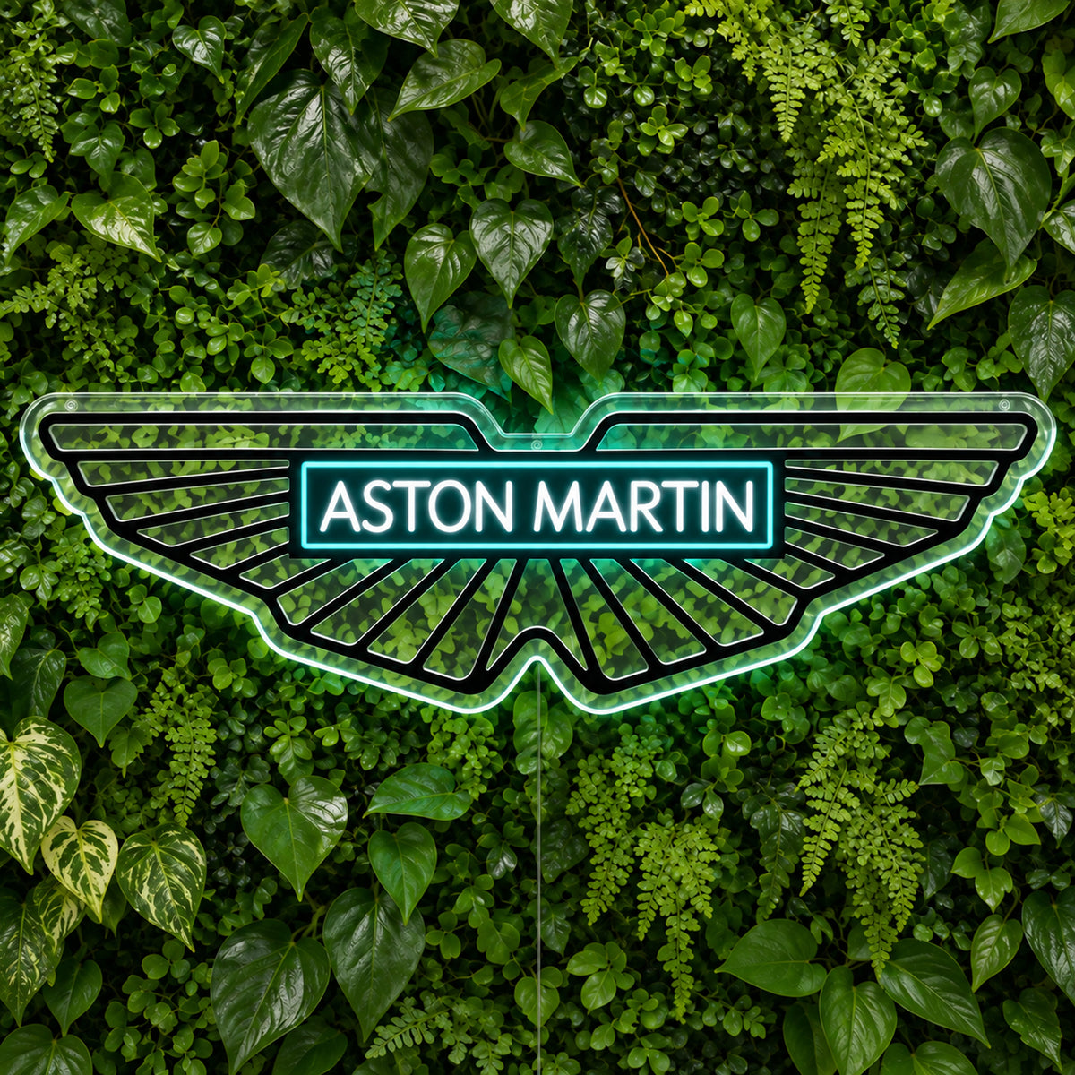 Aston Martin F1 LED Neon Sign, featuring team logo displayed on a green foliage wall.