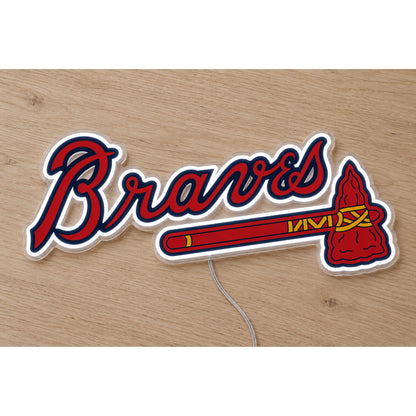 Atlanta Braves LED Neon Sign, featuring illuminated team logo on a wooden surface.
