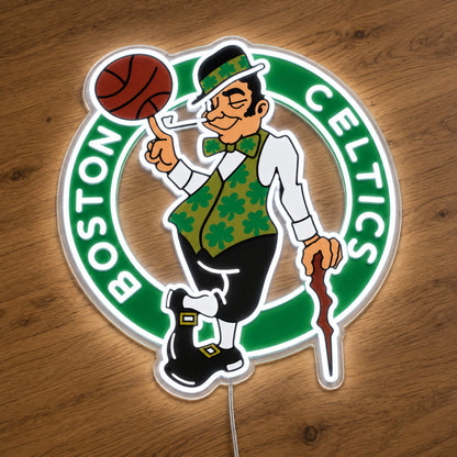 Boston Celtics LED Neon Sign, featuring illuminated team logo on a wooden surface.
