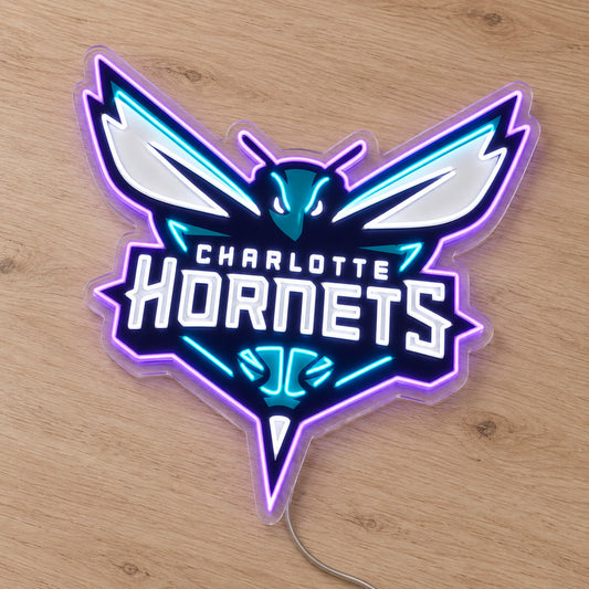 Charlotte Hornets LED Neon Sign, featuring team logo displayed on a wooden surface.