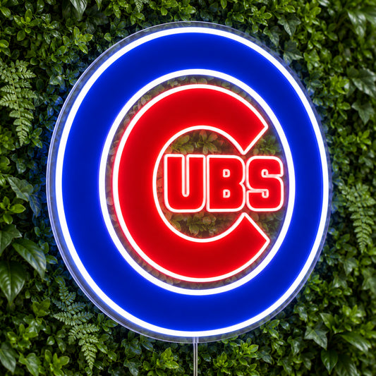 Chicago Cubs LED Neon Sign, featuring illuminated team logo on a green foliage wall.