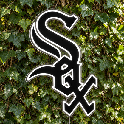 Chicago White Sox LED Neon Sign, featuring team logo displayed on a green foliage wall.