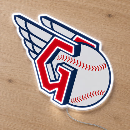Cleveland Guardians LED Neon Sign, featuring illuminated team logo on a wooden surface.