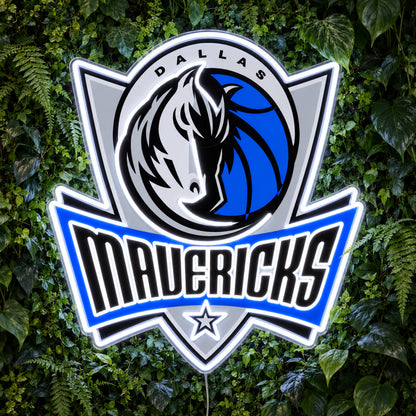 Dallas Mavericks LED Neon Sign, featuring team logo displayed on a green foliage wall.