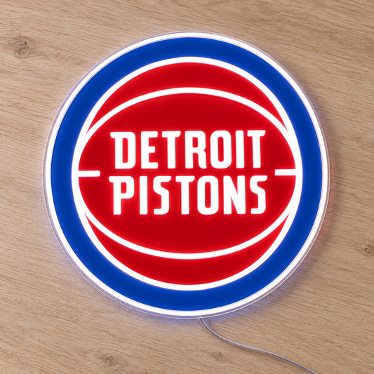 Detroit Pistons LED Neon Sign, featuring illuminated team logo on a wooden surface.