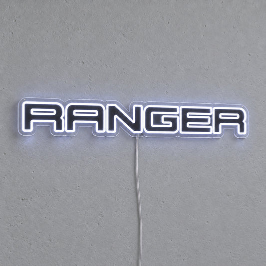 Ford Ranger LED Neon Sign in white, featuring Ranger lettering on a grey wall.