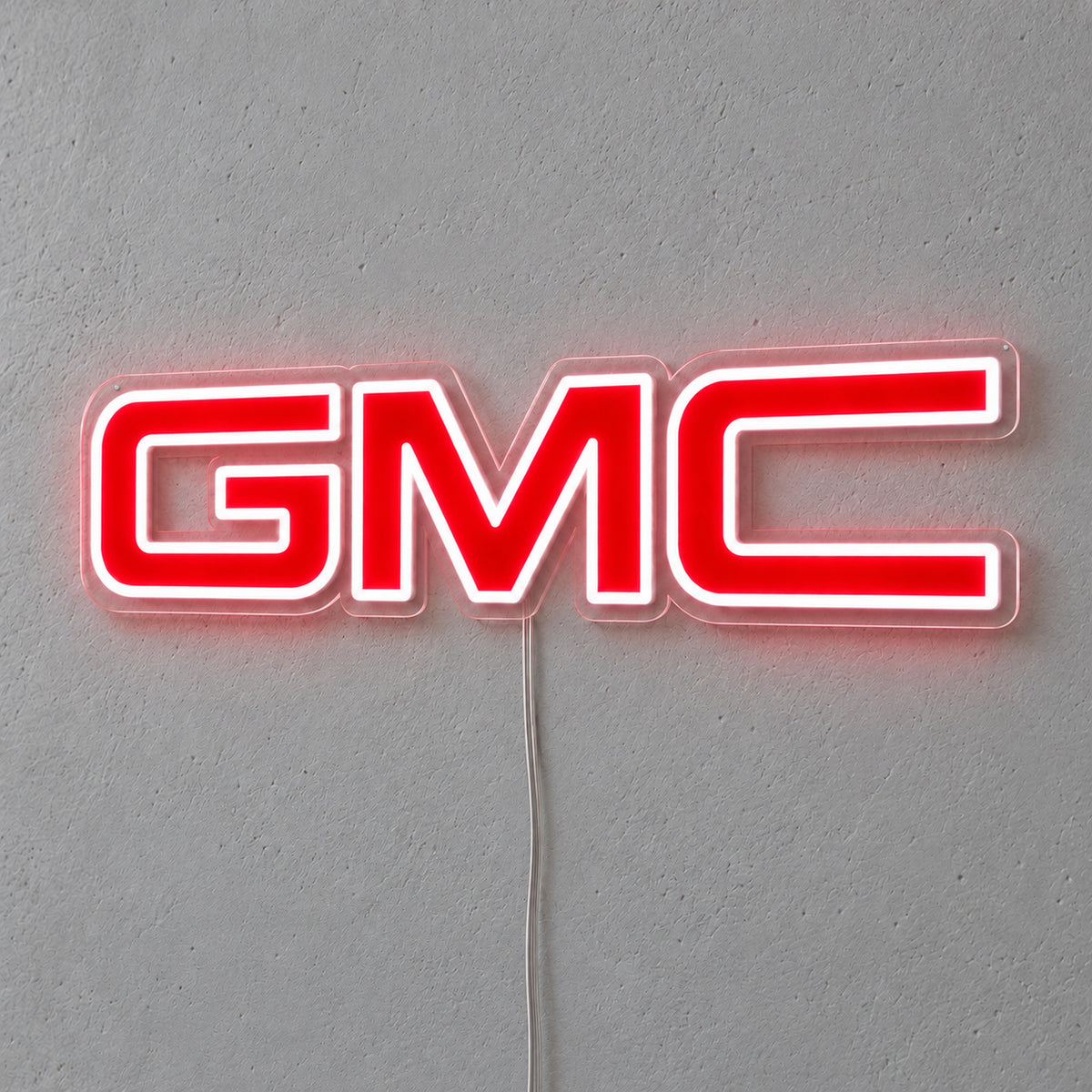GMC LED Neon Sign, featuring illuminated vehicle logo on a light background.