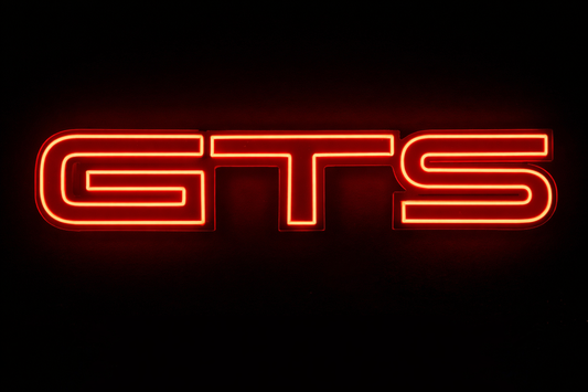 Holden GTS performance LED neon light sign with clean lettering displayed on a garage wall