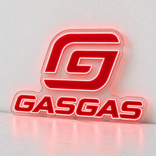 GasGas Logo LED Neon Sign, featuring illuminated GasGas emblem and lettering standing on a light reflective surface.
