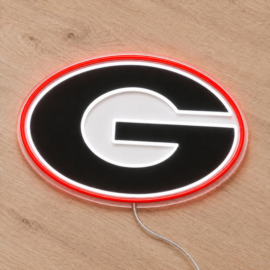 Georgia Bulldogs LED Neon Sign, featuring illuminated team logo on a wooden surface.