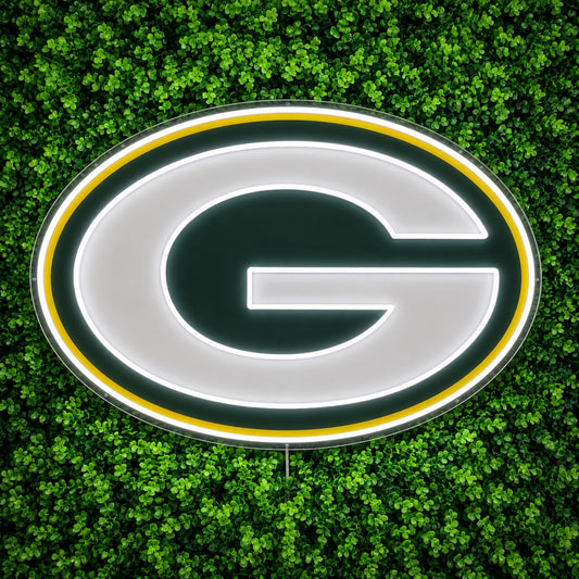 Green Bay Packers LED Neon Sign, featuring illuminated team logo on a green foliage wall.