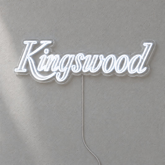 Holden Kingswood LED Neon Sign in white, featuring Kingswood script lettering on a grey wall.