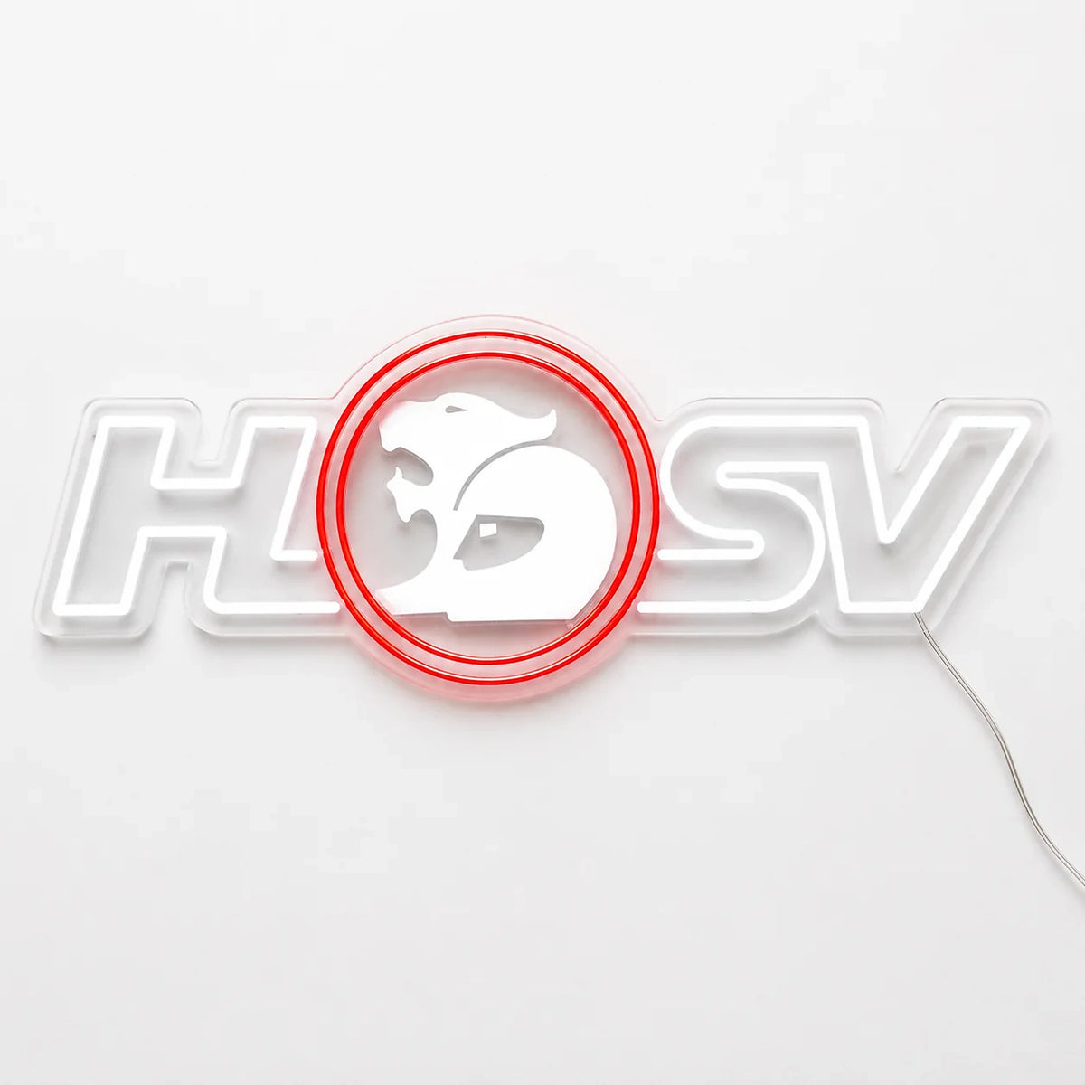 Holden Special Vehicles HSV Neon Sign in red and white, featuring HSV logo with a central circular emblem on a light wall.