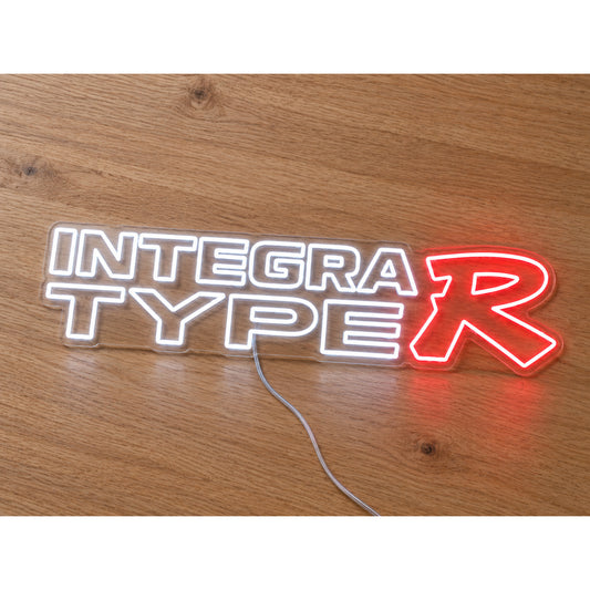 Honda Integra Type R LED Neon Sign in white and red, featuring Integra Type R lettering on a wooden surface.