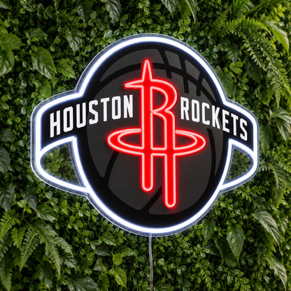 Houston Rockets LED Neon Sign, featuring illuminated team logo on a green foliage wall.