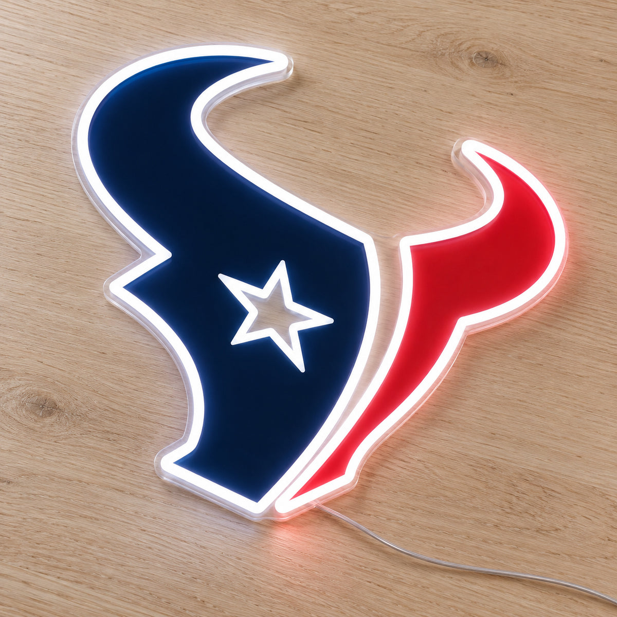 Houston Texans LED Neon Sign, featuring team logo displayed on a wooden surface.