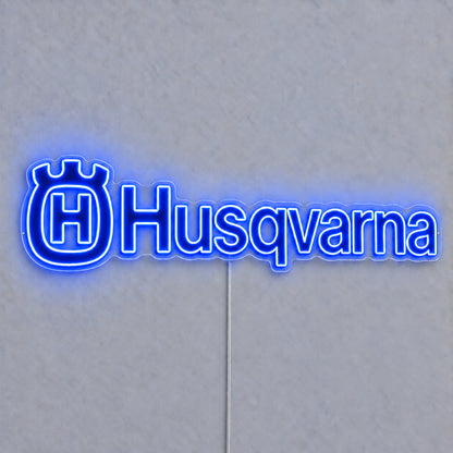 Husqvarna LED Neon Sign, featuring illuminated vehicle logo on a light background.