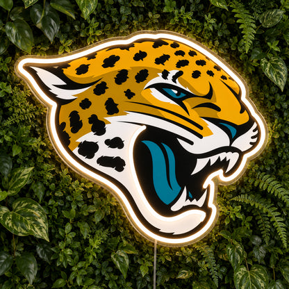 Jacksonville Jaguars LED Neon Sign, featuring team logo displayed on a green foliage wall.