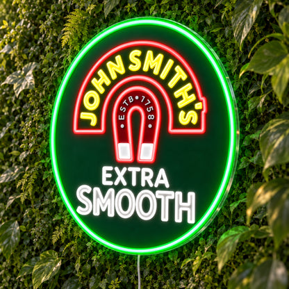 John Smith's LED Neon Sign, featuring beer-brand logo displayed on a green foliage wall.