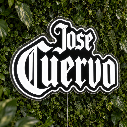 Jose Cuervo LED Neon Sign, featuring illuminated brand logo on a green foliage wall.