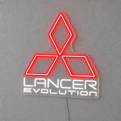 Lancer Evolution Logo LED Neon Sign in red and white, featuring Mitsubishi emblem above Lancer Evolution lettering on a grey wall.