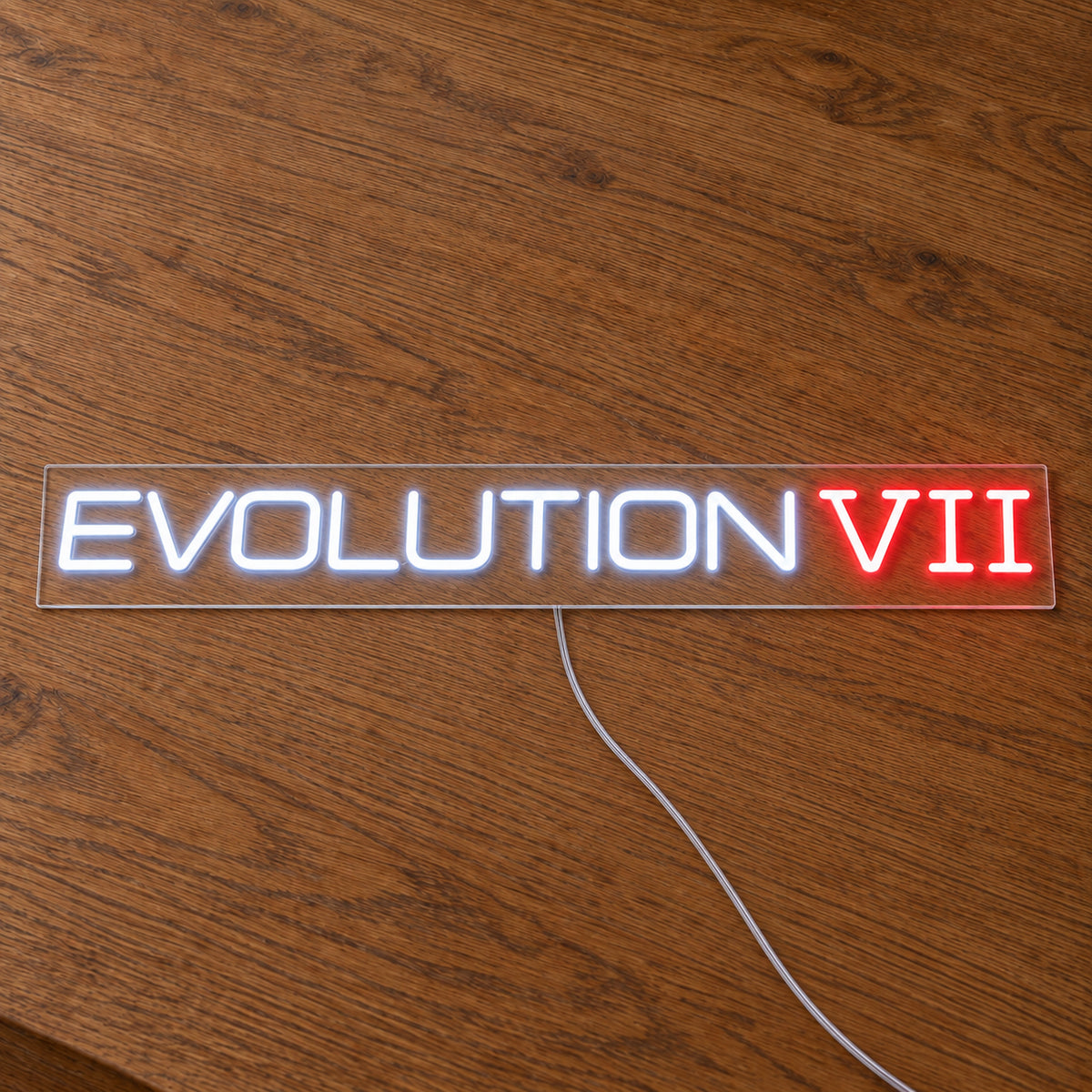 Lancer Evolution VII LED Neon Sign in white and red, featuring Evolution VII lettering on a wooden surface.