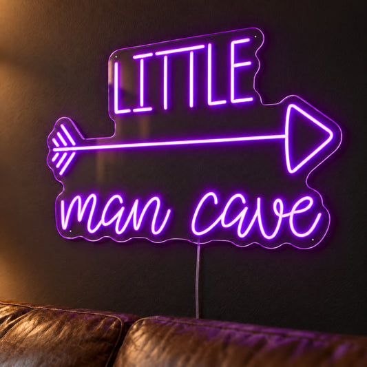 Little Man Cave LED Neon Sign in purple, featuring Little Man Cave lettering with an arrow above a leather sofa.