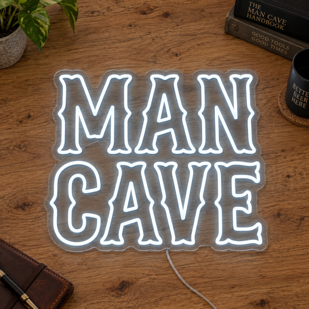 Man Cave LED Neon Sign in white, featuring two lines of rustic Man Cave lettering on a wooden surface.