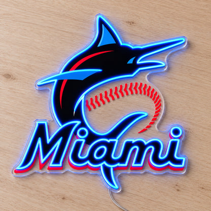 Miami Marlins LED Neon Sign, featuring team logo displayed on a wooden surface.