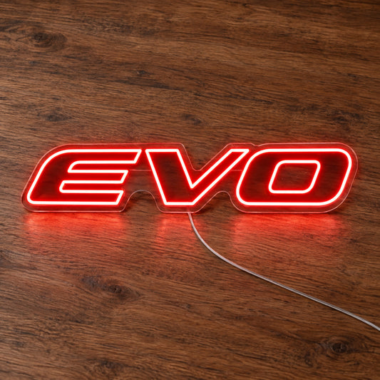 Mitsubishi Evo Logo LED Neon Sign in red, featuring Evo lettering on a wooden surface.