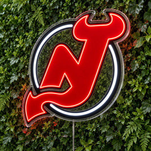 New Jersey Devils LED Neon Sign, featuring team logo displayed on a green foliage wall.