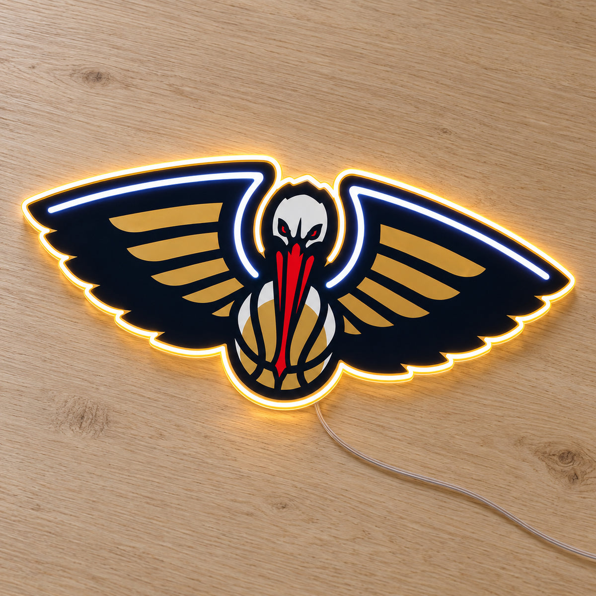 New Orleans Pelicans LED Neon Sign, featuring illuminated team logo on a wooden surface.
