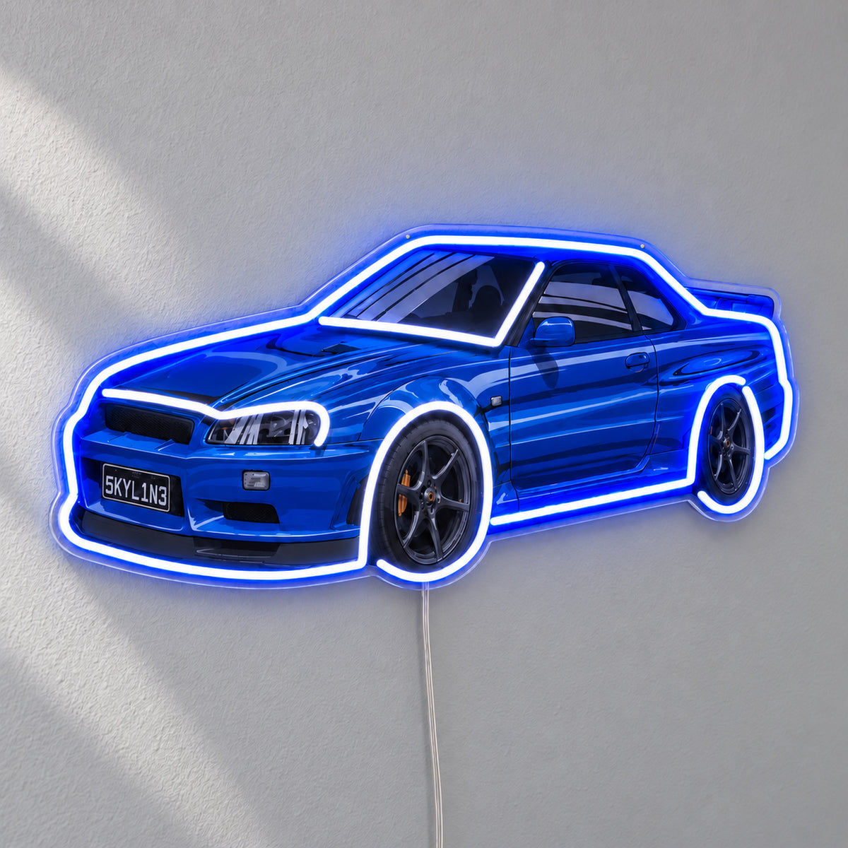 Nissan Skyline R34 LED Neon Sign in blue and white, featuring Nissan Skyline R34 car design on a light wall.