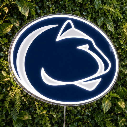 Penn State Nittany Lions LED Neon Sign, featuring team logo displayed on a green foliage wall.