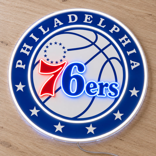 Philadelphia 76ers LED Neon Sign, featuring illuminated team logo on a wooden surface.