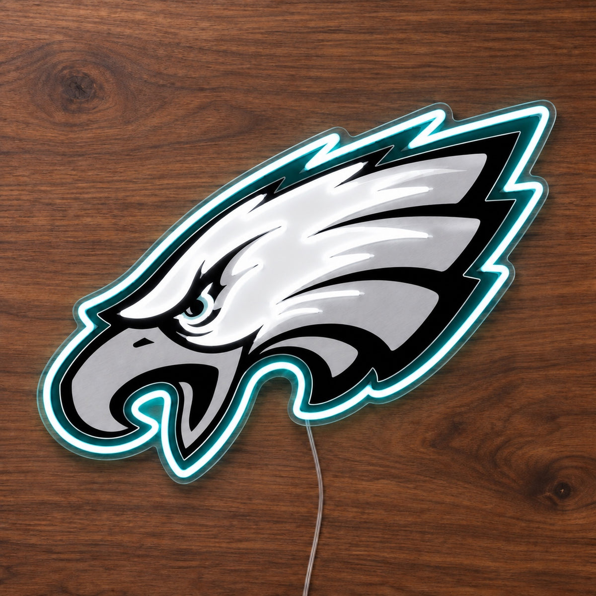 Philadelphia Eagles LED Neon Sign, featuring illuminated team logo on a wooden surface.